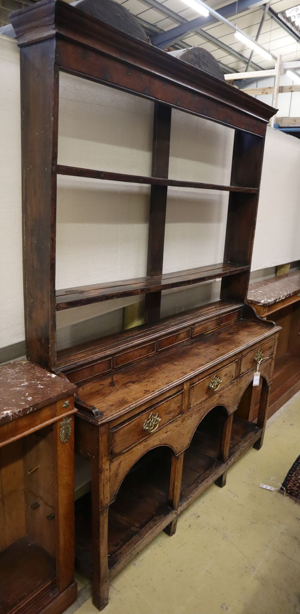 A small George III and later oak dresser, W.125cm, D.36cm, H.184cm